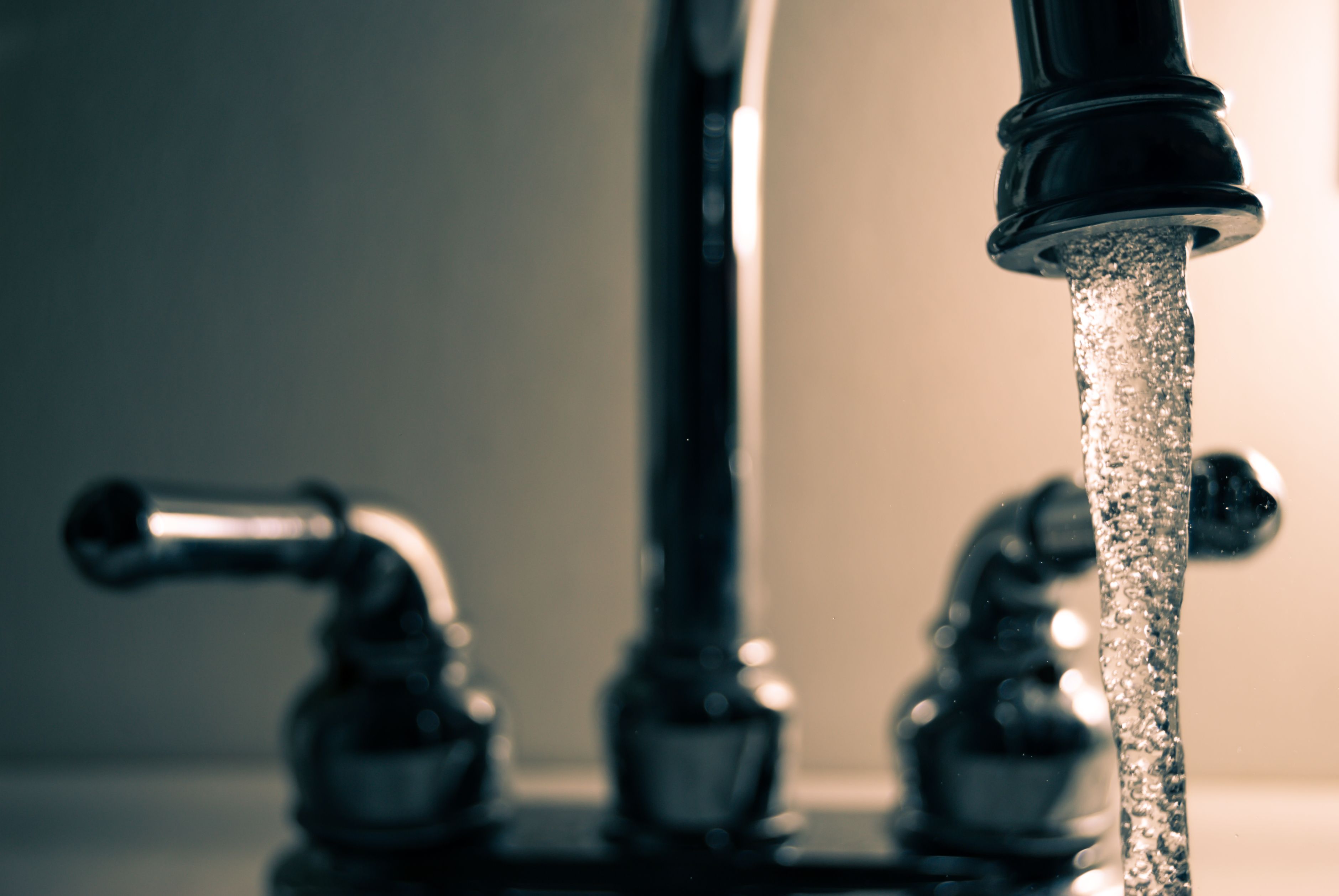Kitchen faucet and supply line — clear water and clean plumbing